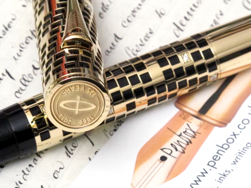 Parker Duofold Giant in 18crt gold with inliad diamonds.